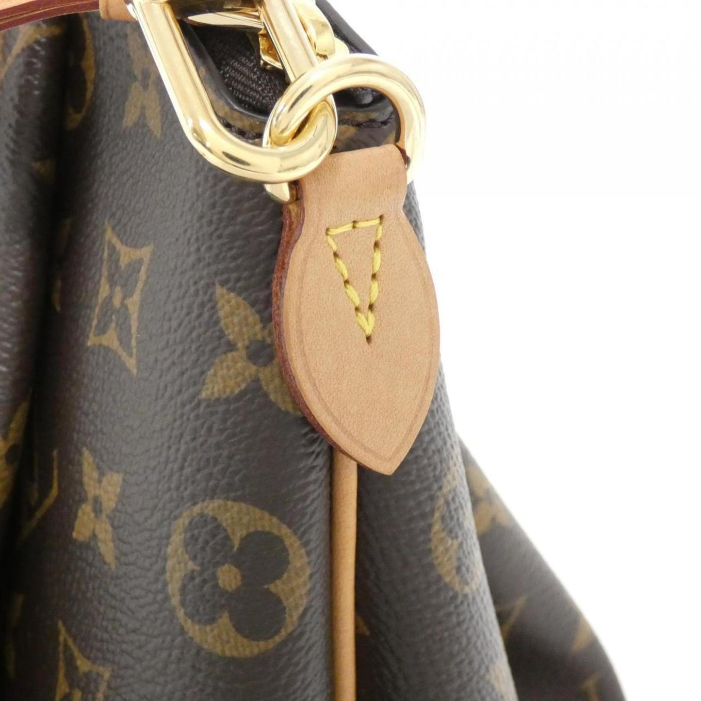 Louis Vuitton Rivoli Canvas Brown