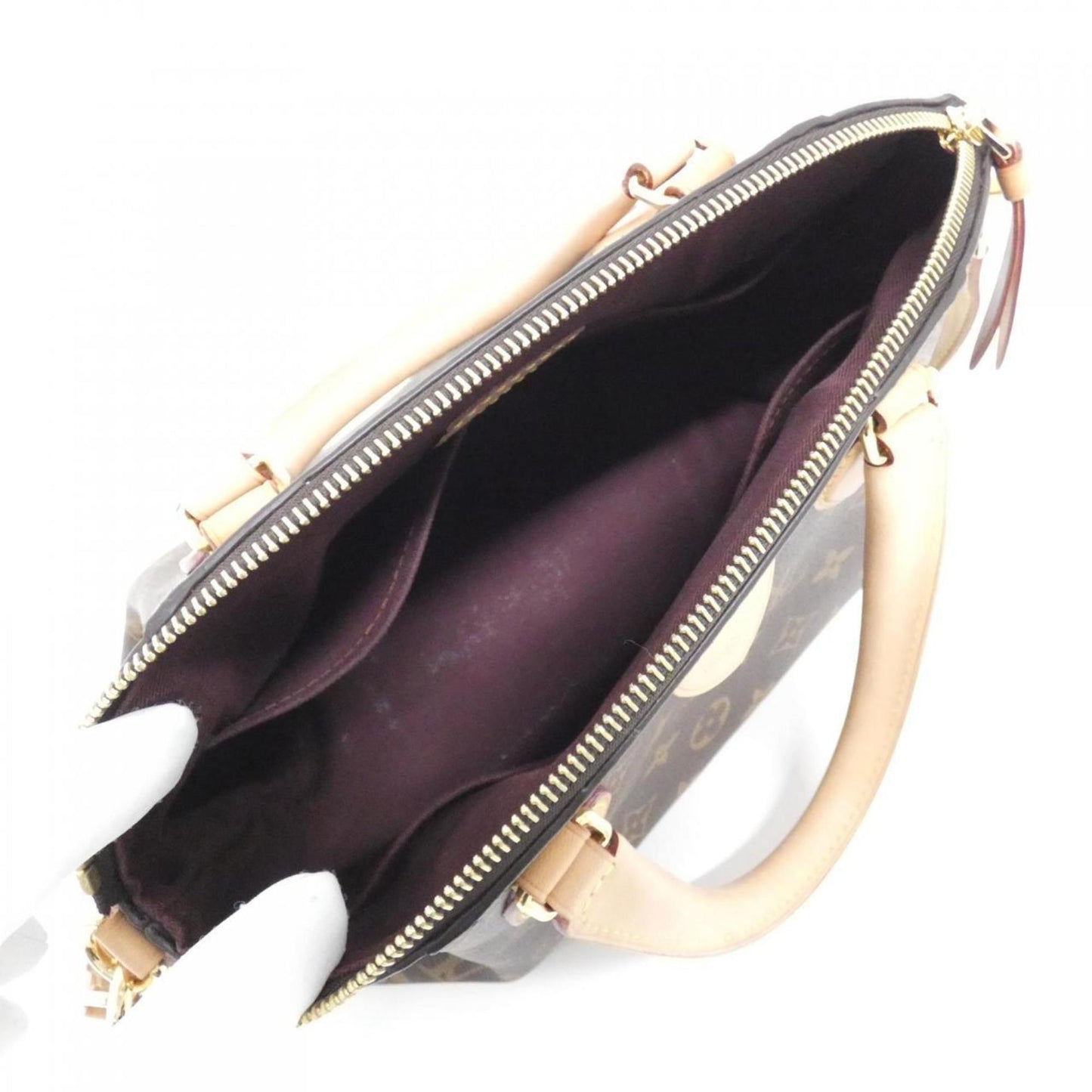 Louis Vuitton Rivoli Canvas Brown