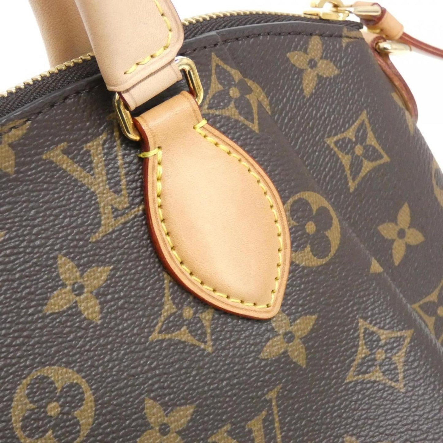 Louis Vuitton Rivoli Canvas Brown